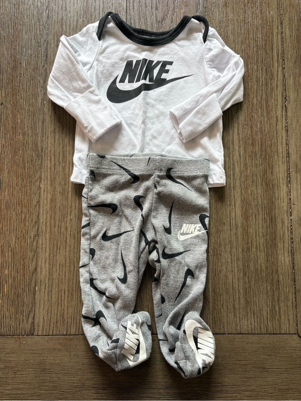 Nike Baby Black & White Long sleeve Shirt and Footed Pants Set- NB